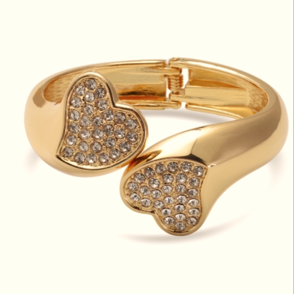 AUSTRIAN CRYSTAL HEART SHAPED BANGLE/CUFF BRACELET.  FITS ALL SIZED WRISTS.